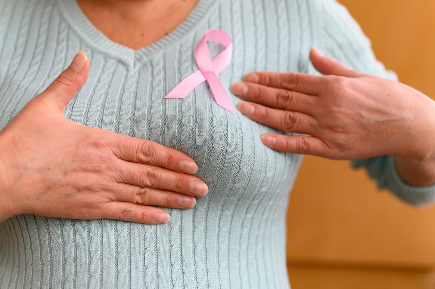 hands of a mature woman examine her breasts a pin 2023 11 27 05 14 23 utc 1